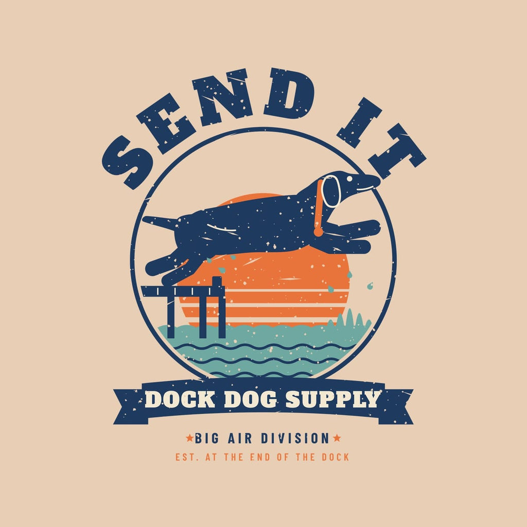 Close-up of the Send It print showing the leaping lab, dock pilings, striped sun, waves and distressed texture