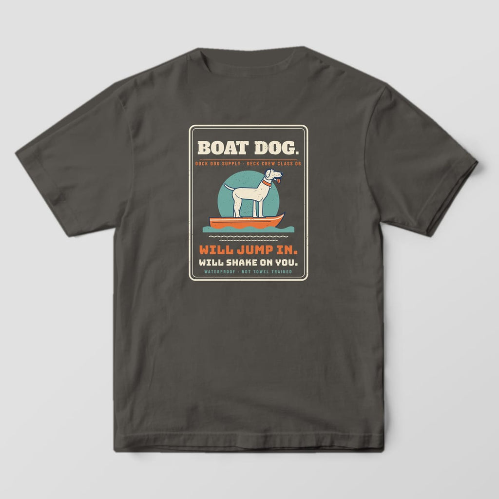 Back of a pepper Comfort Colors tee with a Boat Dog badge, a lab standing on an orange skiff and Will Jump In, Will Shake on You
