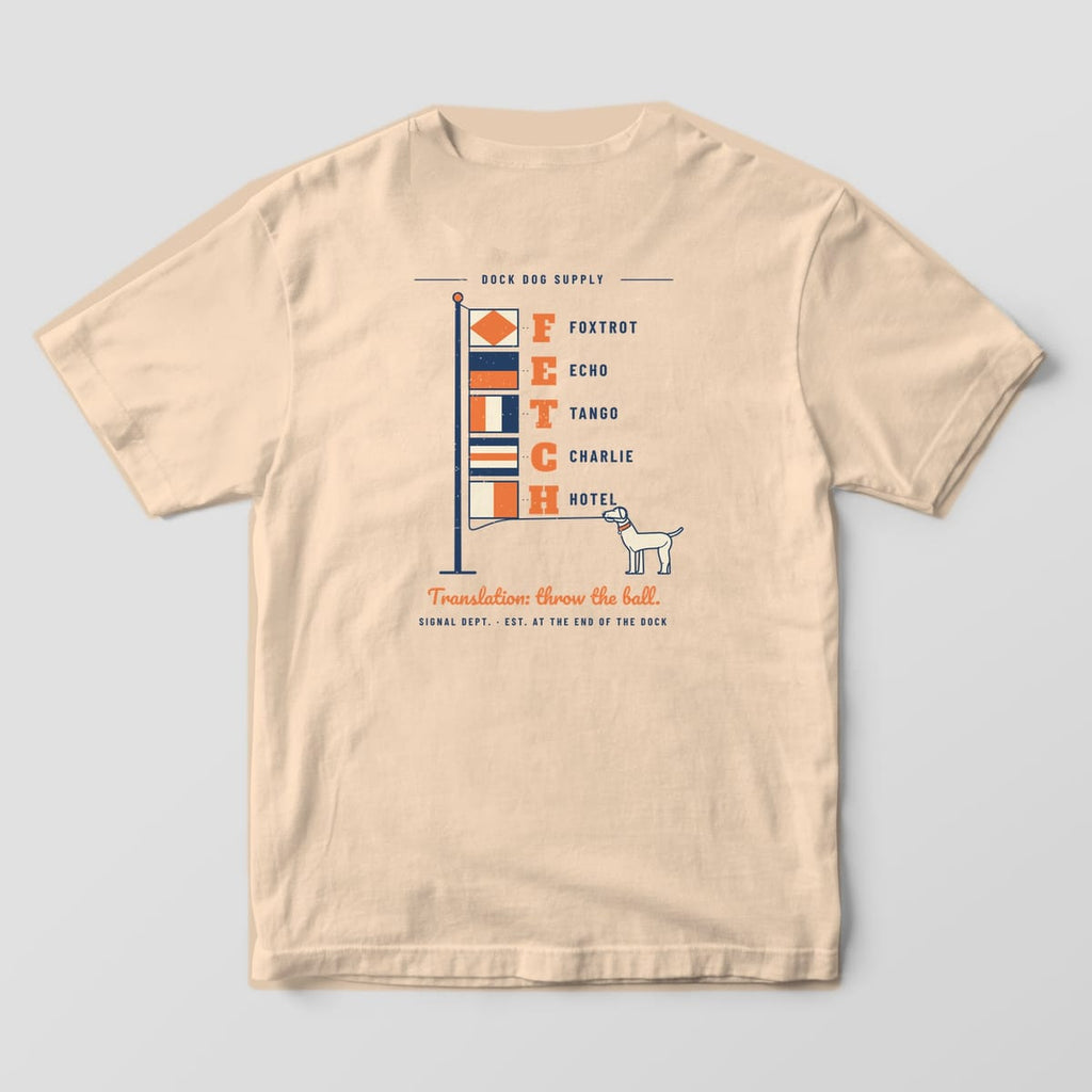 Back of an ivory Comfort Colors tee with five signal flags on a mast, orange letters FETCH and their phonetic names