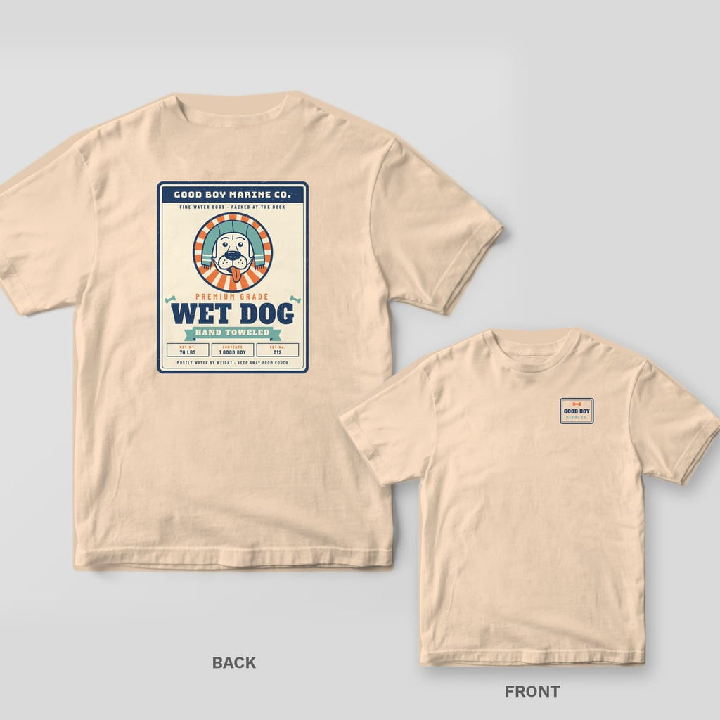 Ivory tee with a retro tackle-box label back print of a towel-wrapped lab and Premium Grade Wet Dog, Good Boy Marine Co. stamp on the front