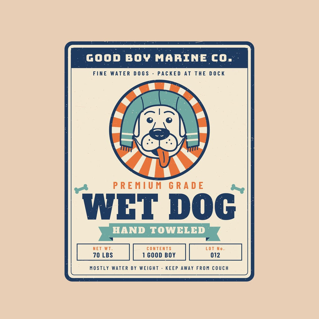 Close-up of the label print showing the towel-wrapped lab, sunburst medallion, spec boxes and distressed texture