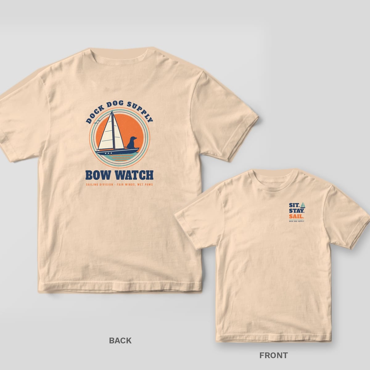 Ivory tee with a sailboat and a dog on the bow against an orange sunset, Bow Watch on the back, Sit Stay Sail on the front chest