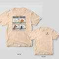 Ivory tee with a Know Your Dock Dogs field guide back print of a lab, doodle, shepherd and spaniel, tennis ball logo on the front