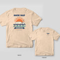 Ivory tee with a lab asleep on a sunny dock and Dock Nap Champion on the back, No Bad Days on the Water on the front chest