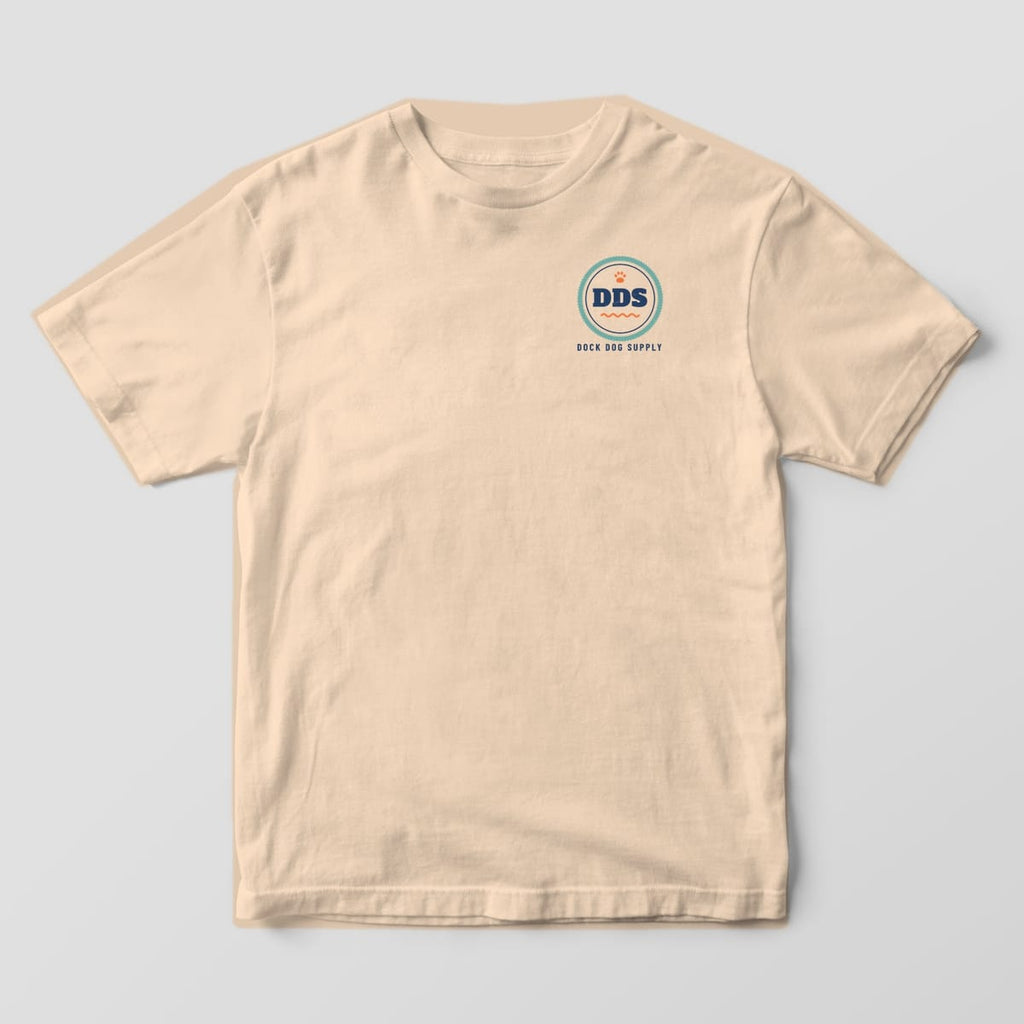 Front of an ivory Comfort Colors tee with a small DDS monogram in a teal rope ring