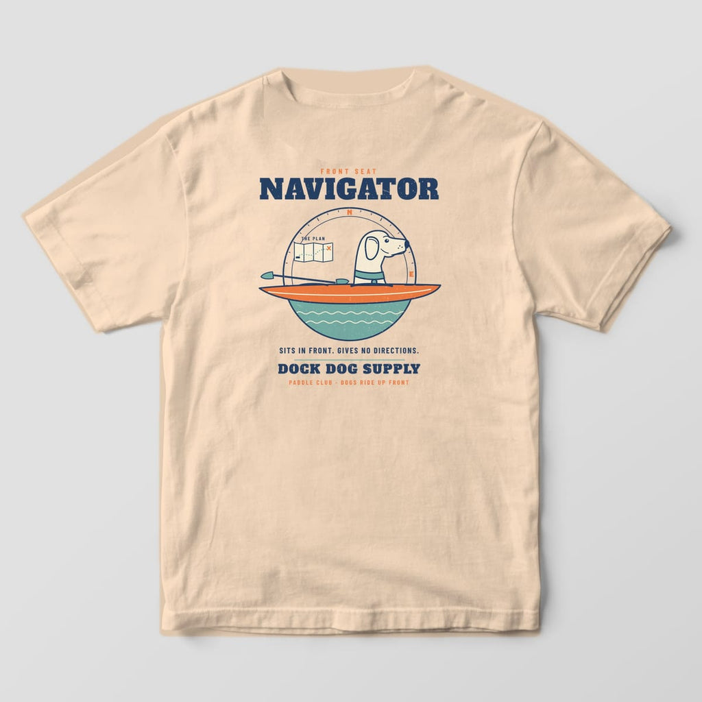 Back of an ivory Comfort Colors tee with a cream lab in an orange kayak, compass ring, folded map and Navigator