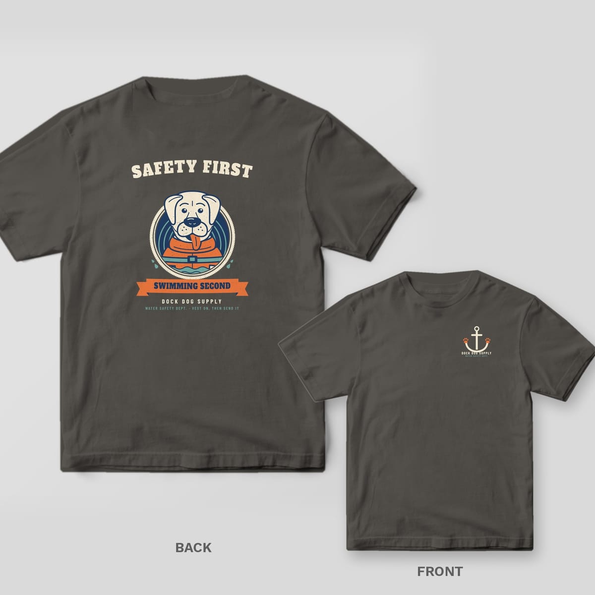 Charcoal tee with a lab in an orange life vest inside a rope ring and Safety First Swimming Second on the back, paw anchor on the front