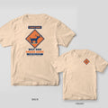 Ivory tee with an orange caution sign of a shaking dog and Wet Dog Shake Zone on the back, small Shake Zone diamond on the front