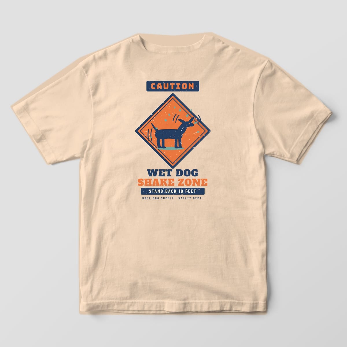 Back of an ivory Comfort Colors tee with a caution diamond showing a shaking dog and Stand Back 10 Feet