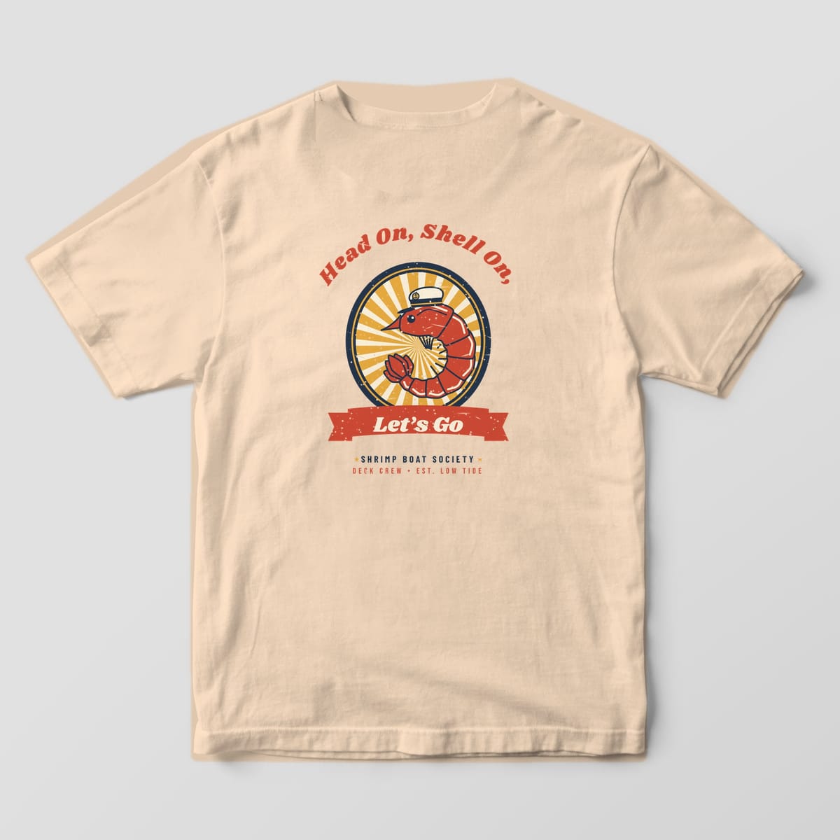 Back of an Ivory Comfort Colors 1717 tee with a red shrimp wearing a white captain's cap in a navy oval, Head On, Shell On above and a Let's Go banner below.