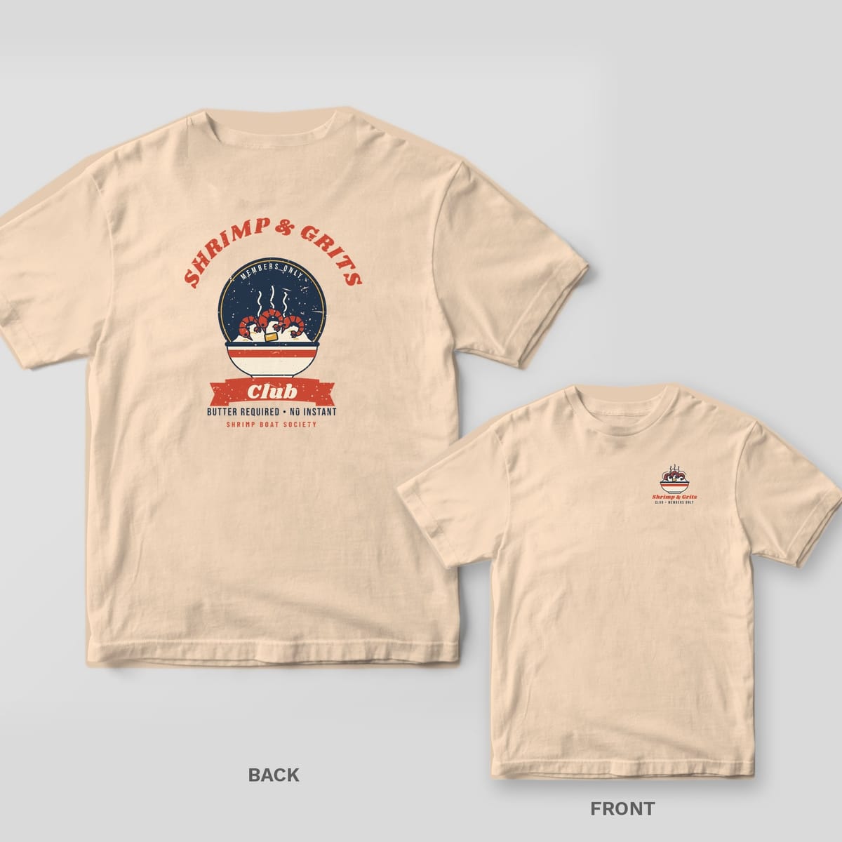 Ivory Comfort Colors tee back showing a navy diner badge with a bowl of shrimp and grits and a red Club banner, with the front pocket print inset