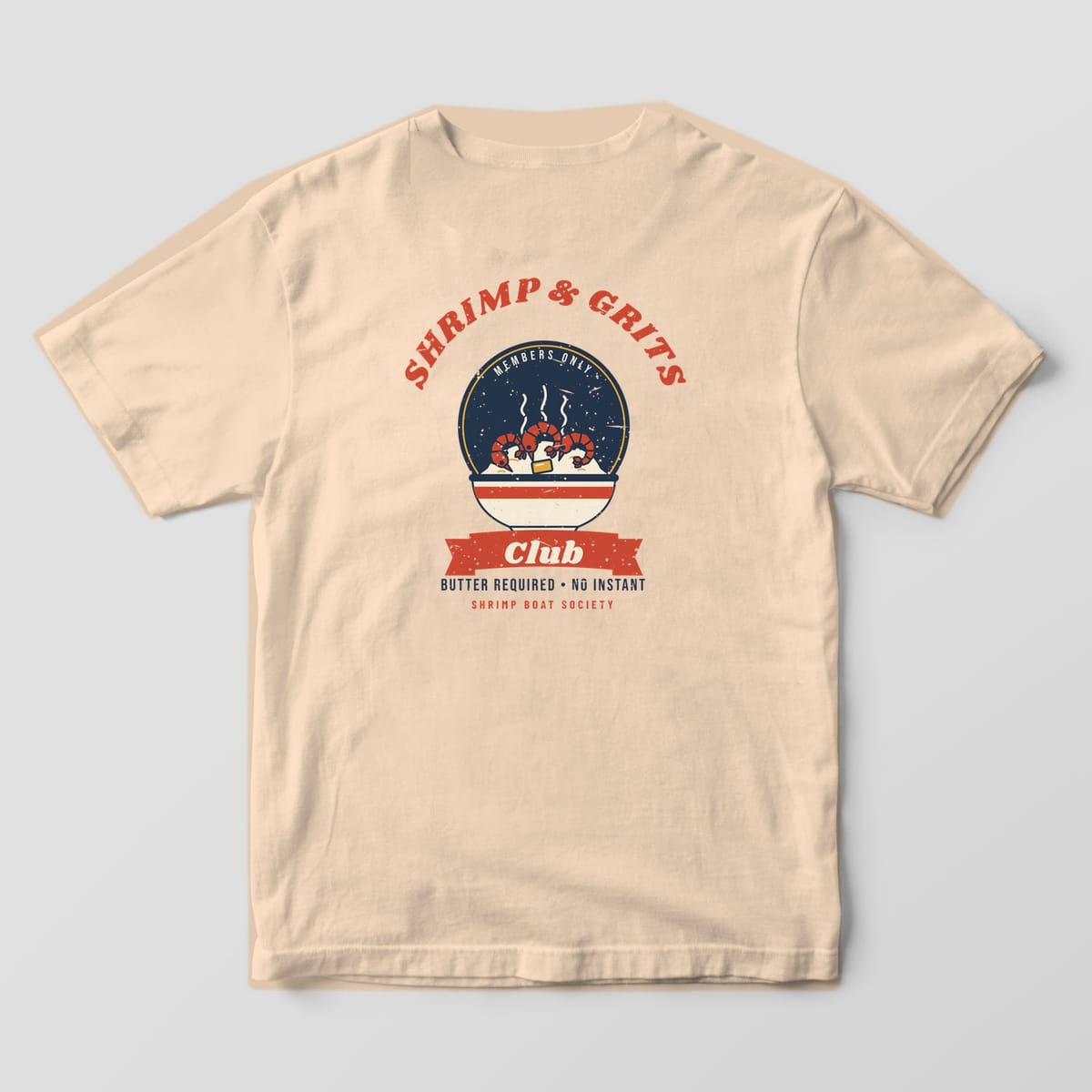 Back of an ivory Comfort Colors 1717 tee with the Shrimp and Grits Club diner badge print