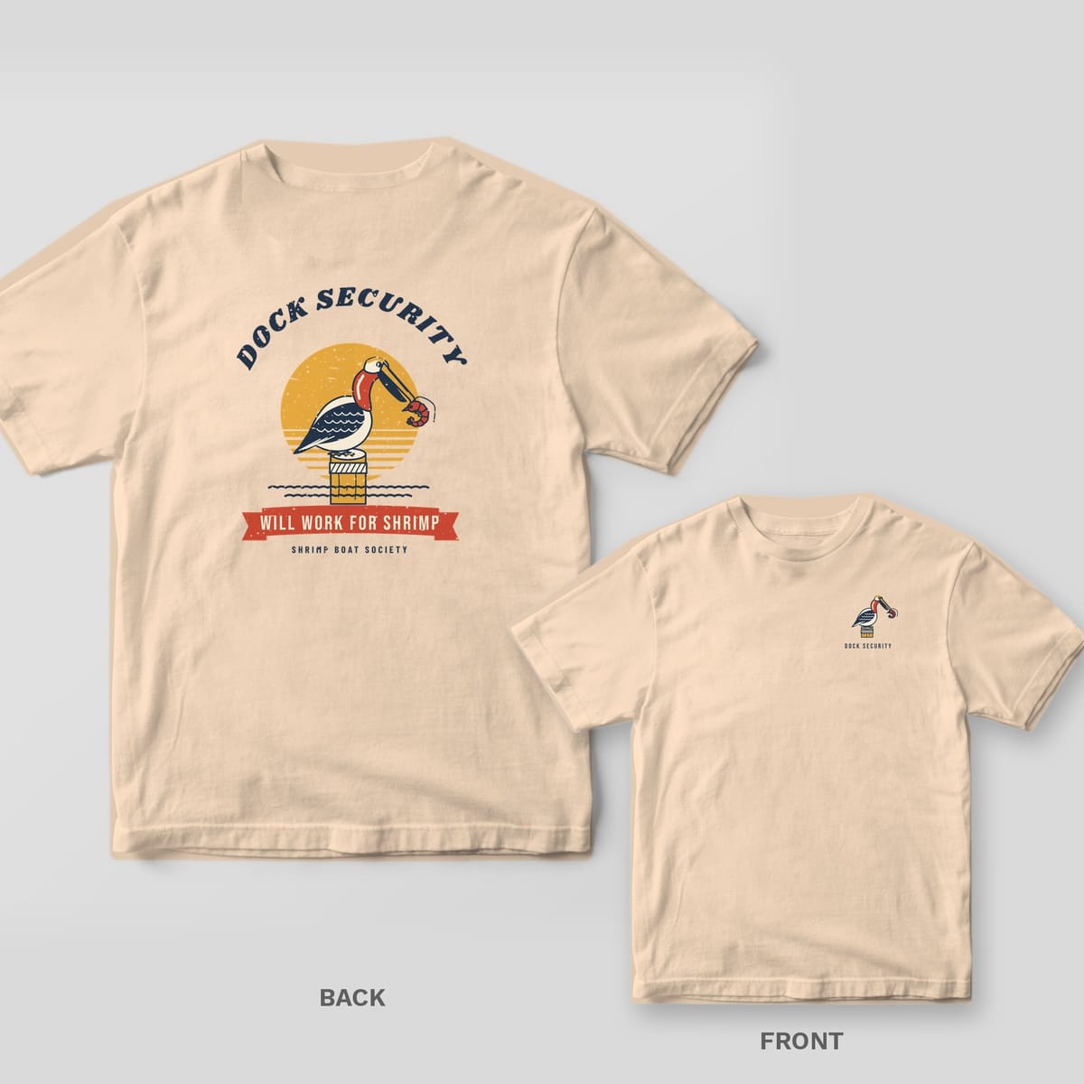 Ivory Comfort Colors tee back with a pelican on a piling holding a shrimp under Dock Security lettering, with the front chest print inset