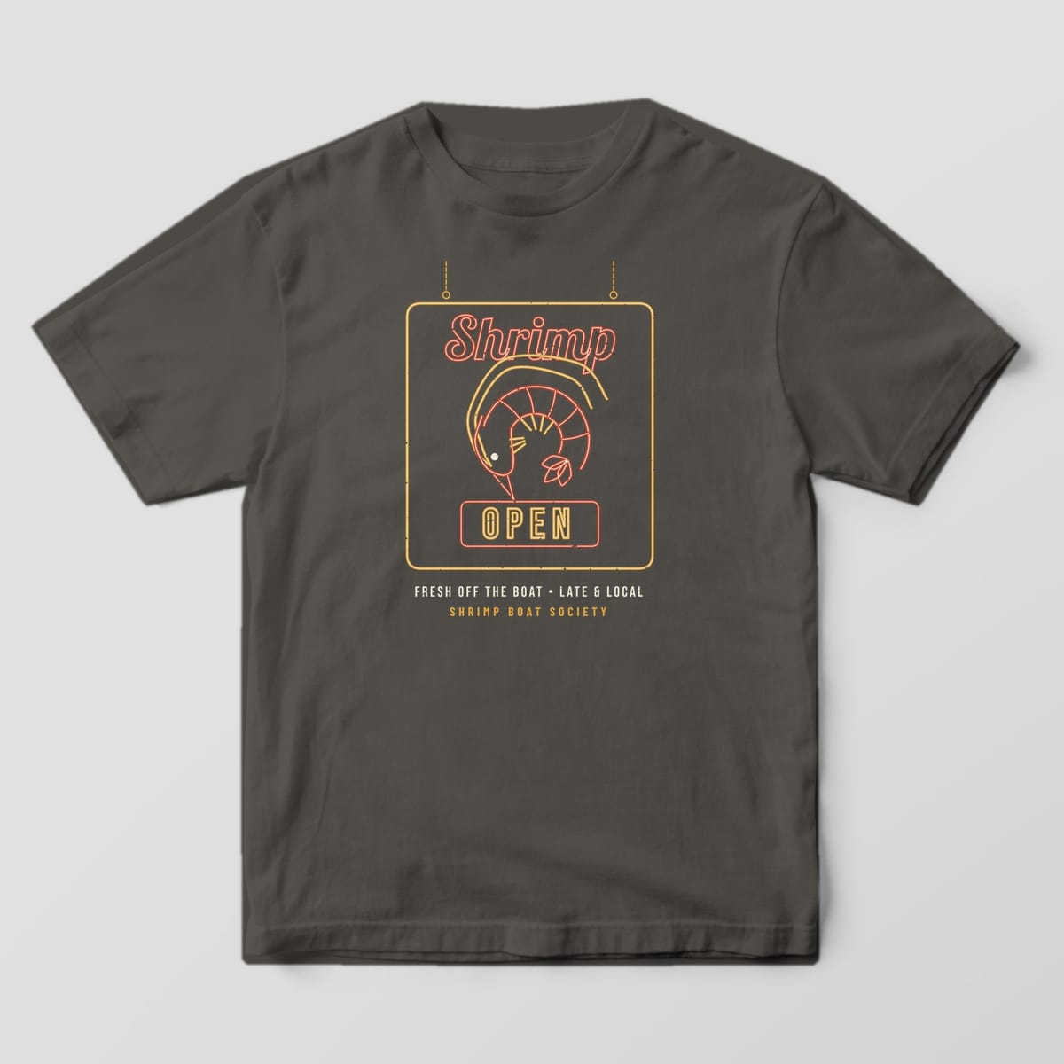 Pepper Comfort Colors tee with a full-front neon-style sign print of a shrimp and the word OPEN
