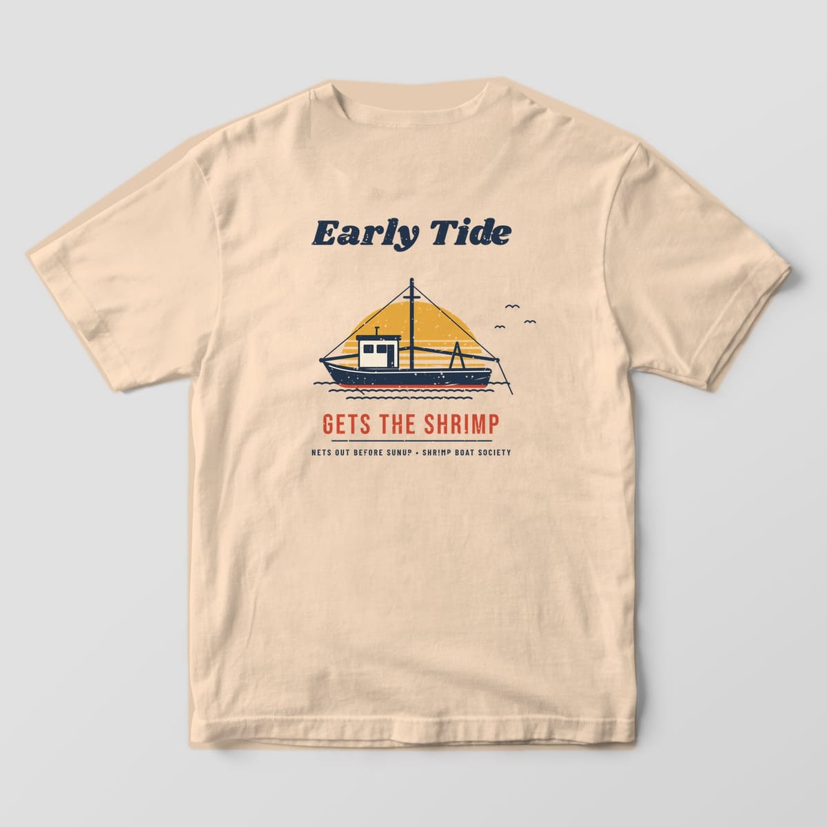 Back of an ivory Comfort Colors 1717 tee with the Early Tide shrimp trawler sunrise print