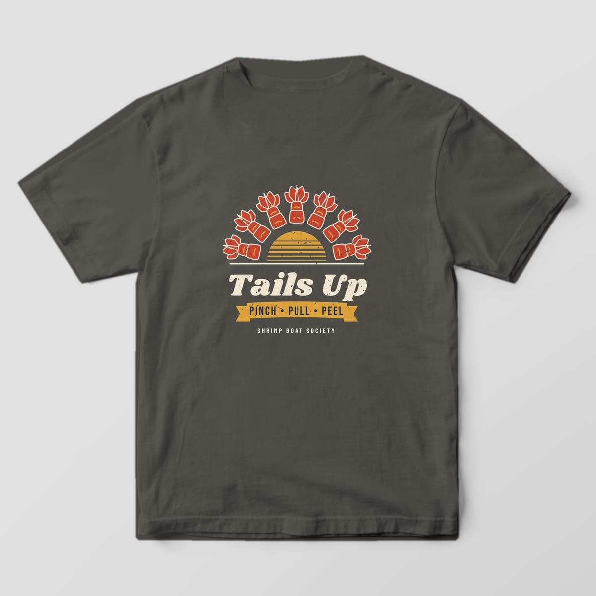 Back of a pepper Comfort Colors 1717 tee with the Tails Up shrimp sunburst print