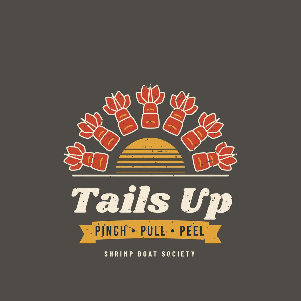 Close-up of the Tails Up print: red shrimp tails with cream outlines, gold striped sun and banner, cream lettering