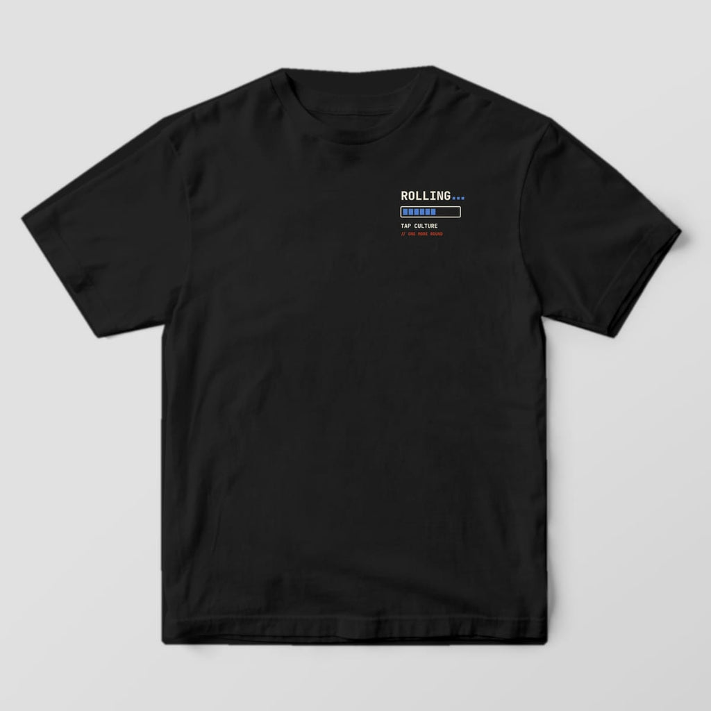 Front of a black Comfort Colors 1717 tee with ROLLING... and a blue loading bar on the left chest.