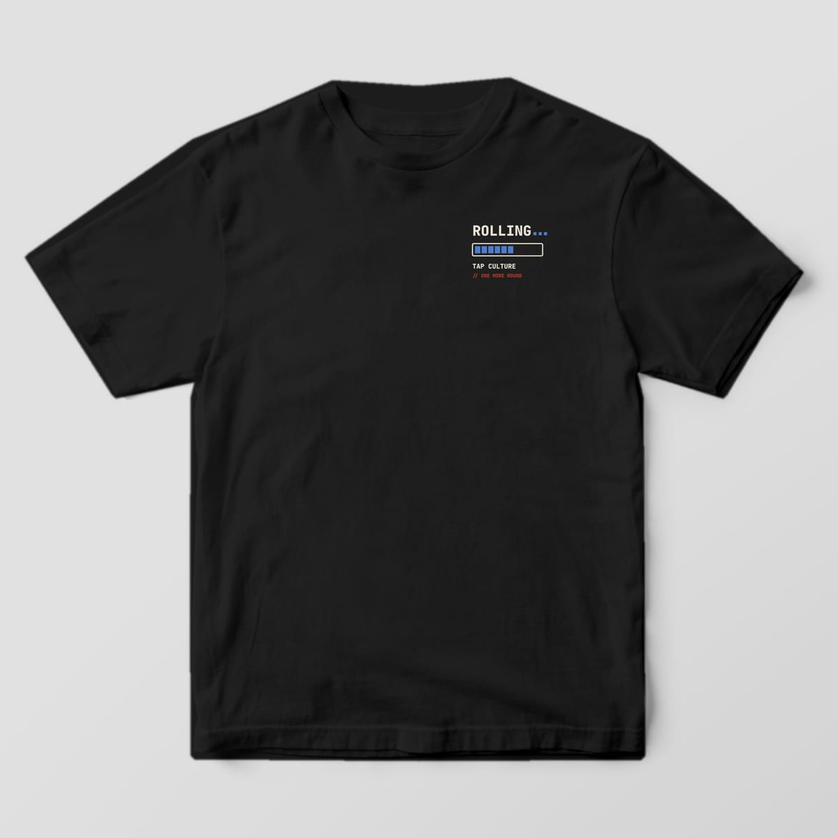 Front of a black Comfort Colors 1717 tee with ROLLING... and a blue loading bar on the left chest.