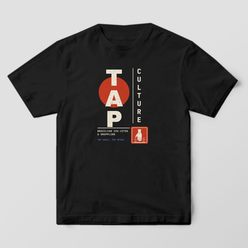 Black Comfort Colors tee with a full front print: cream stacked TAP over a red sun, vertical CULTURE lettering and a red tapping-hand seal.