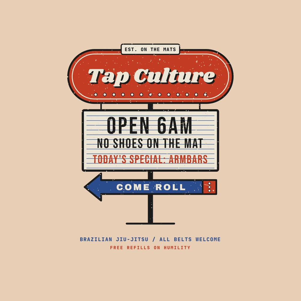 Close-up of the diner sign artwork: Tap Culture script with bulbs, letterboard with Open 6AM and a blue arrow.