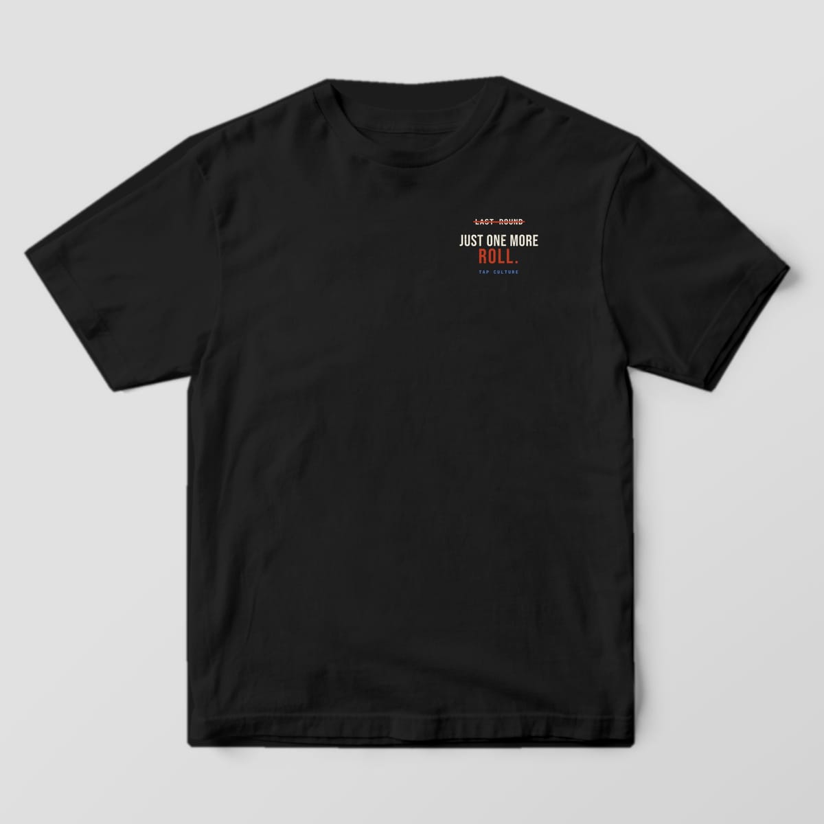 Front of a black Comfort Colors 1717 tee with a crossed-out LAST ROUND and JUST ONE MORE ROLL on the left chest.