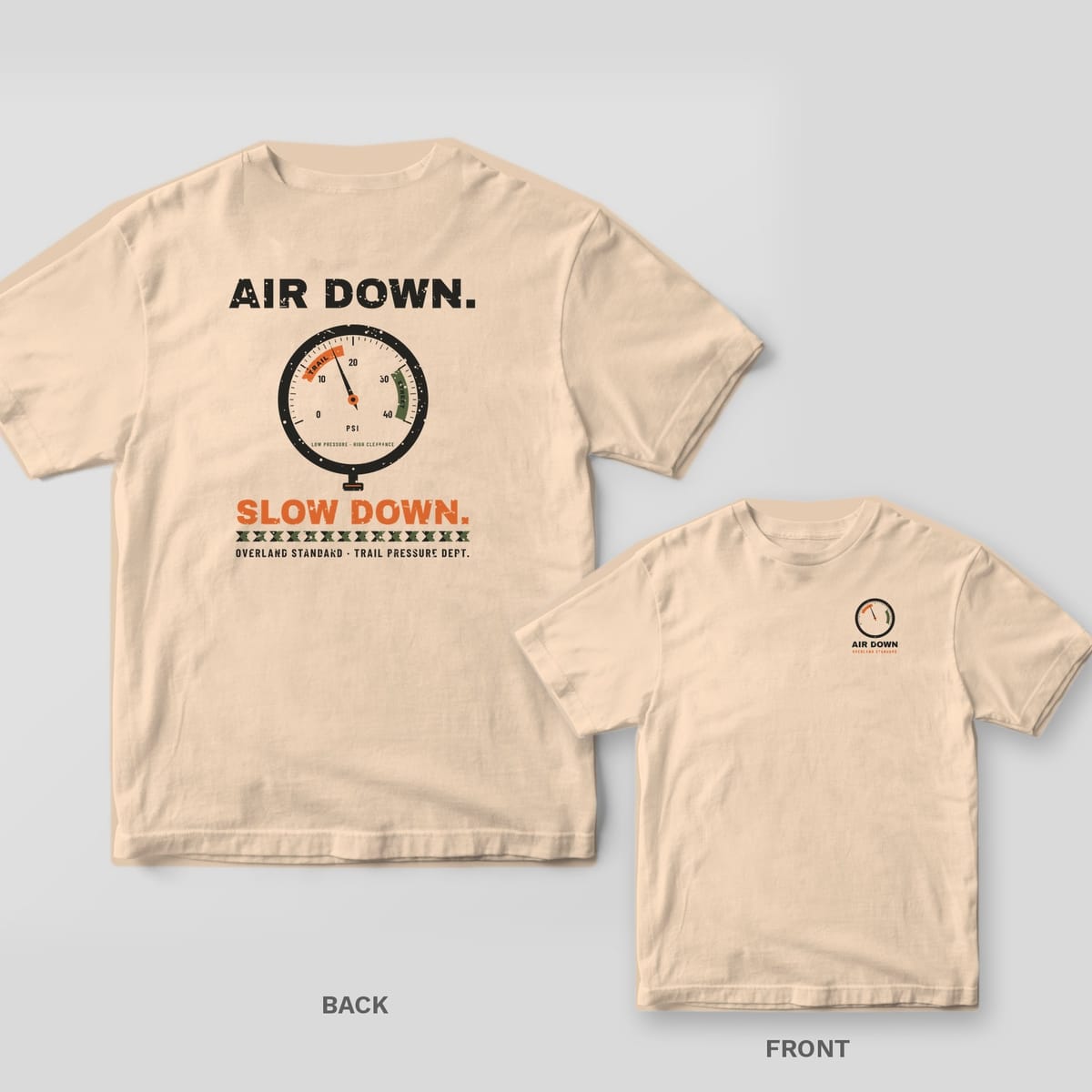 Ivory Comfort Colors tee shown back and front: a big tire pressure gauge with Air Down. Slow Down. on the back and a small gauge icon on the chest.