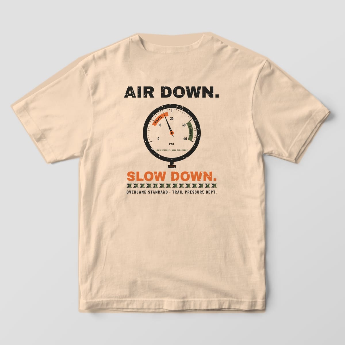Back of a Ivory Comfort Colors 1717 tee with a black tire pressure dial, orange trail zone and the words Air Down. Slow Down.