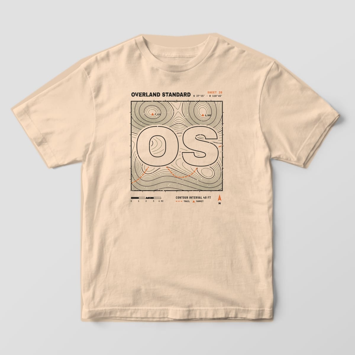 Front of a Ivory Comfort Colors tee with a full-front topographic map print and a large OS cut out of the contour lines.