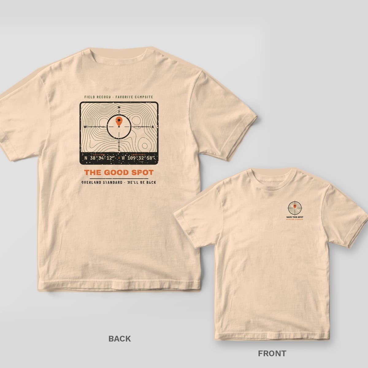 Back and front of a ivory Comfort Colors T-shirt with a topo map coordinate badge with a crosshair, orange map pin, latitude and longitude and the words The Good Spot; small chest print on the front