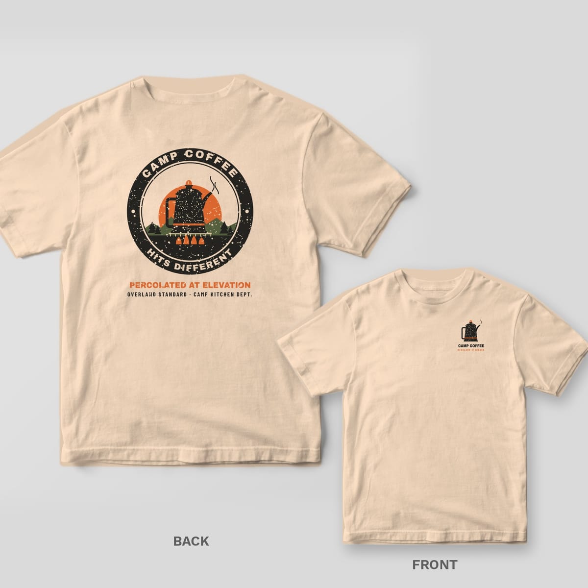 Back and front of a ivory Comfort Colors T-shirt with a round badge with a speckled enamel percolator over a campfire at sunrise and the words Camp Coffee Hits Different; small chest print on the front