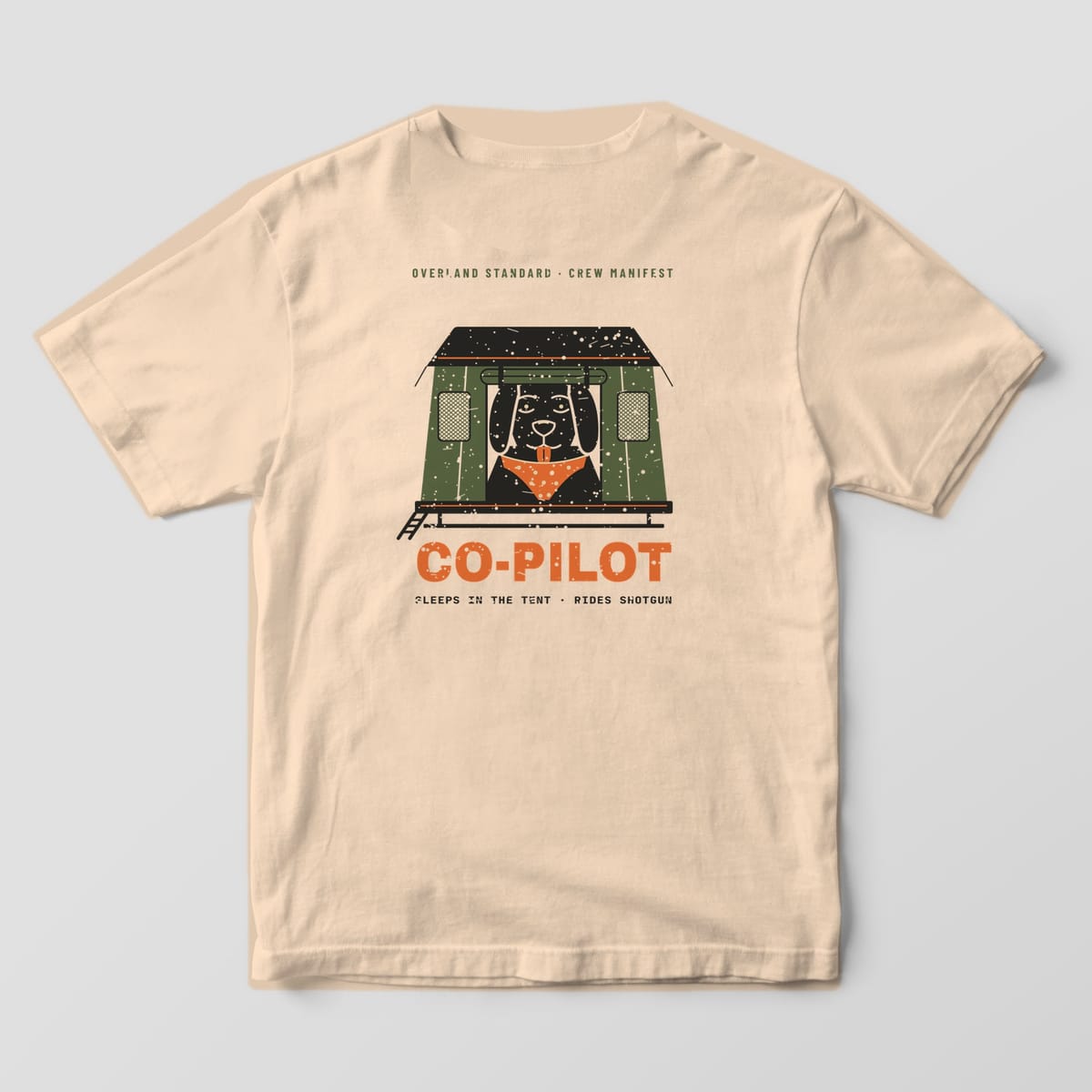 Back of a ivory Comfort Colors 1717 T-shirt showing a black lab in an orange bandana looking out of an olive rooftop tent door above the word Co-Pilot
