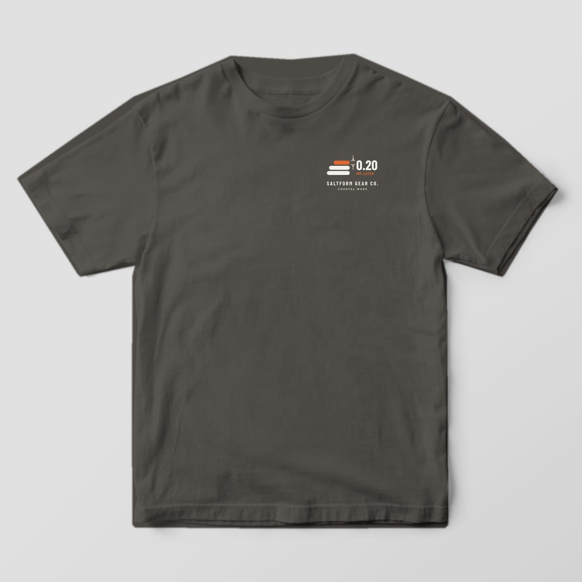 Front of a pepper gray Comfort Colors 1717 tee with three stacked layer bars and a 0.20 MM dimension callout on the left chest.