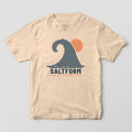 Front of an ivory Comfort Colors tee with a large navy layered wave and orange sun over the SALTFORM wordmark.