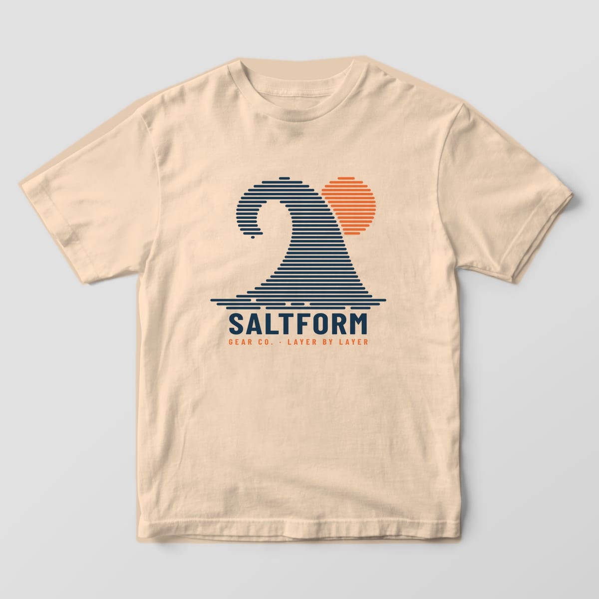 Front of an ivory Comfort Colors 1717 tee with the full-front navy and orange layer wave graphic.