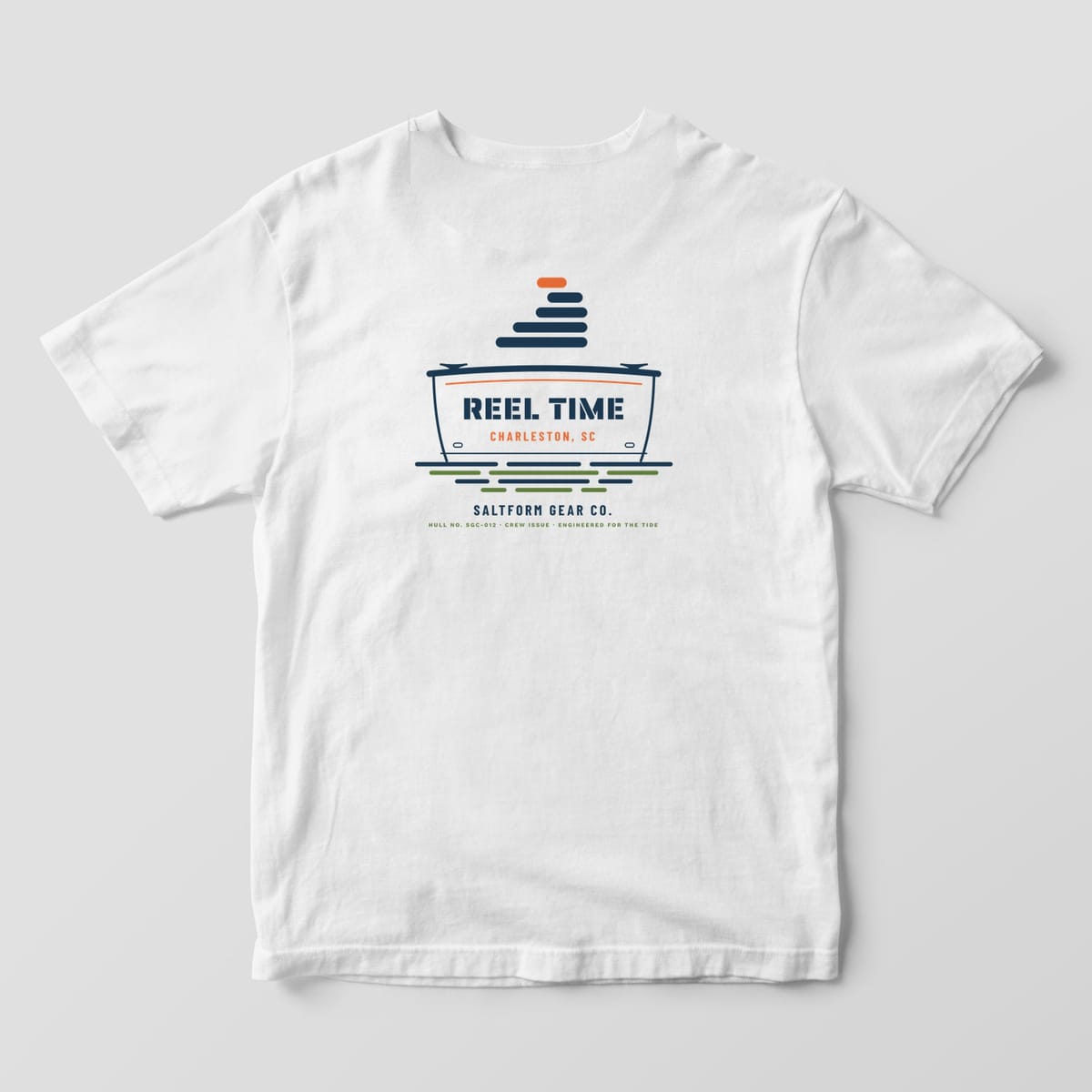 Back of a white Comfort Colors 1717 tee with a boat transom reading REEL TIME, CHARLESTON, SC under a layer-wave logo.