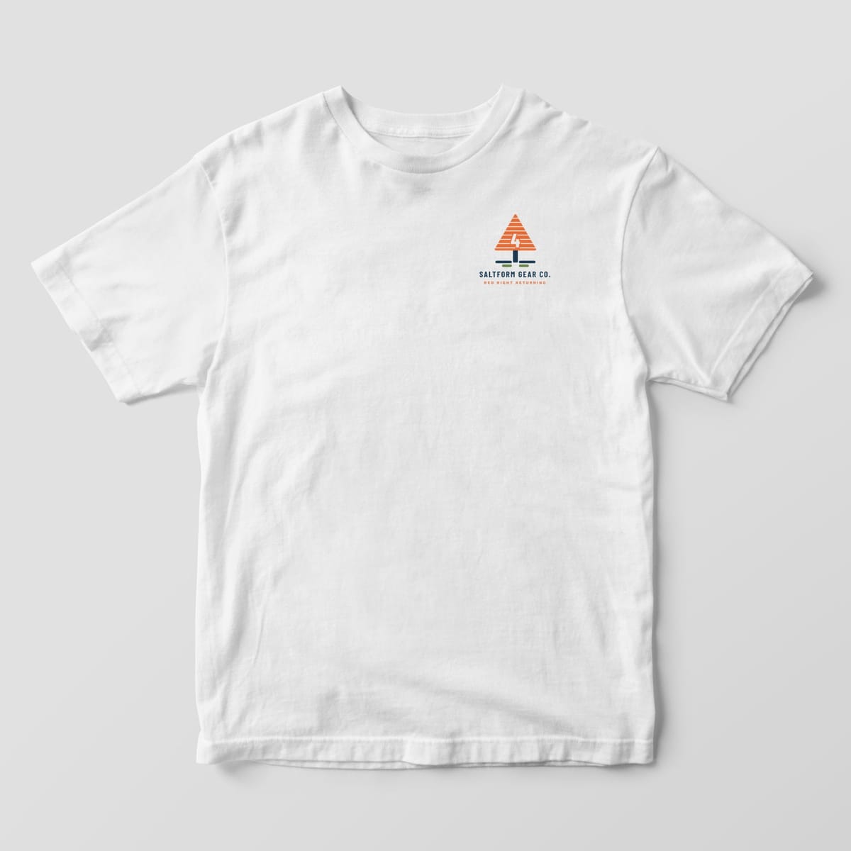 Front of a white Comfort Colors 1717 tee with a small layered red daymark icon and Saltform Gear Co. text.
