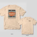 Ivory tee shown back and front: back has a grey Now Leasing Luxury Lofts wall peeling to reveal a rust Condemned Goods Co. ghost sign; front has Unfit for Occupancy text.