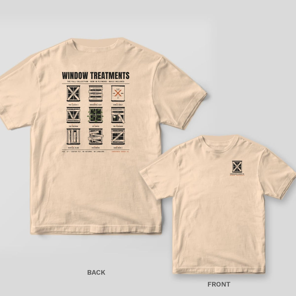 Ivory tee shown back and front: back has a grid of nine boarded-up windows labeled like a catalog under the words Window Treatments; front has a small boarded-up window with crossed planks.