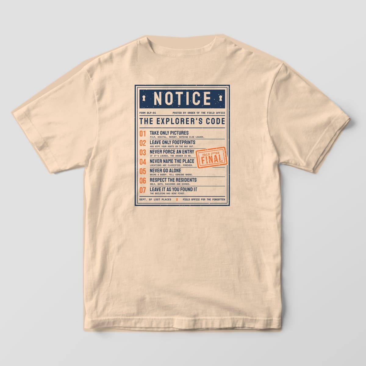 Back of an Ivory Comfort Colors 1717 tee printed with a navy and orange posted Notice titled The Explorer's Code with seven numbered rules such as Take Only Pictures and Never Force an Entry, and an orange Final rubber stamp.