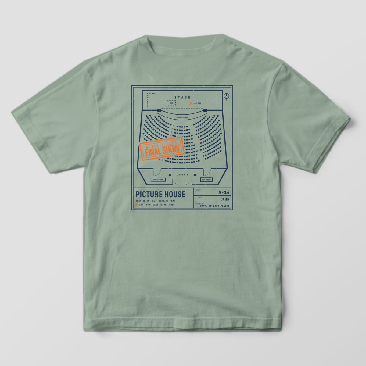 Back of a Bay Comfort Colors 1717 tee printed with a navy architectural seating plan of an old theater with curved rows of seats, a stage and lobby, stamped House Closed, Final Show in orange.