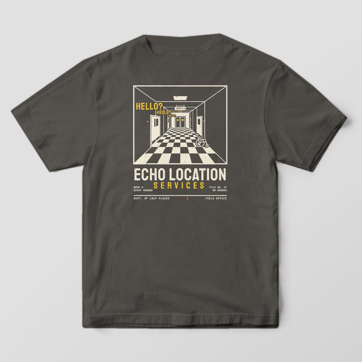 Back of a Pepper Comfort Colors 1717 tee printed with a cream one-point-perspective hospital hallway with a checkered floor, side doors and a wheelchair, with yellow Hello? text echoing down it, above Echo Location Services.