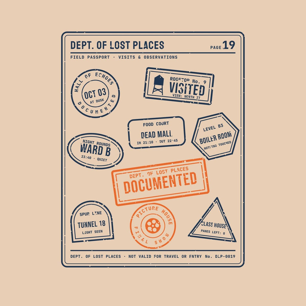 Back print artwork close-up: a navy passport-style page covered in rubber stamps from imaginary abandoned places, such as a rooftop, a tunnel and a dead mall, with an orange Documented stamp, lightly speckled.