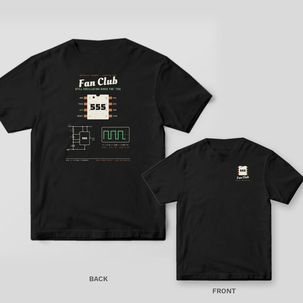 Black tee shown back and front: back has a large 555 timer chip pinout under Fan Club script with a schematic and square wave; front has a small 555 chip.