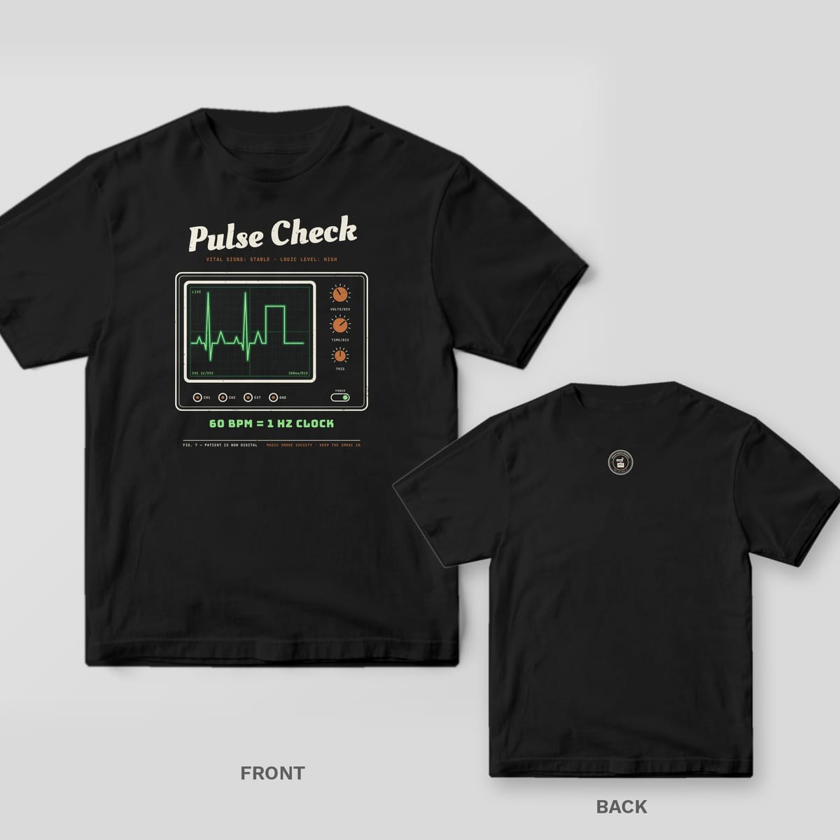 Black tee shown front and back: front has a vintage oscilloscope with a green heartbeat trace becoming a square wave under Pulse Check; back has a small round seal.