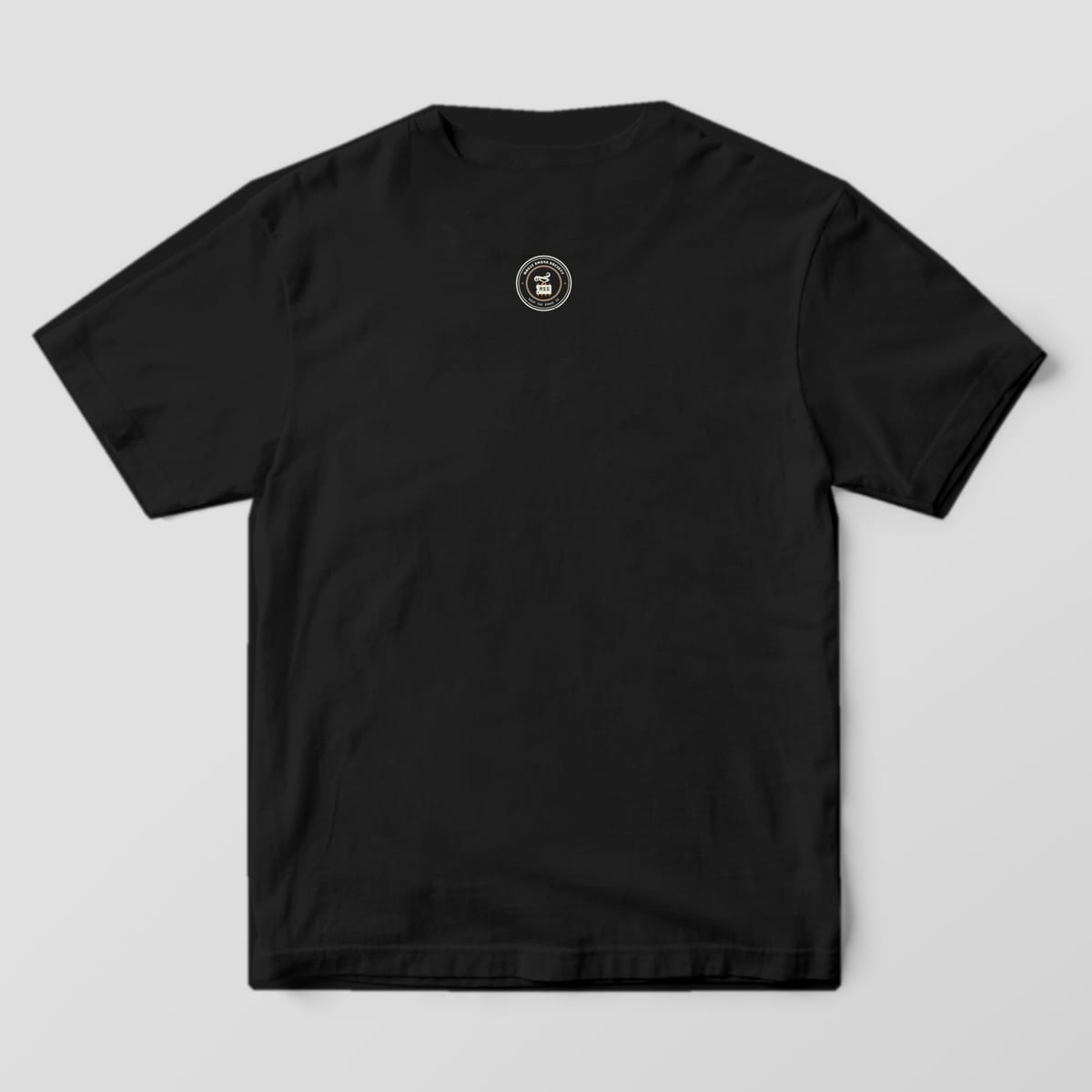Back of a black Comfort Colors 1717 tee with a small Magic Smoke Society seal below the collar.