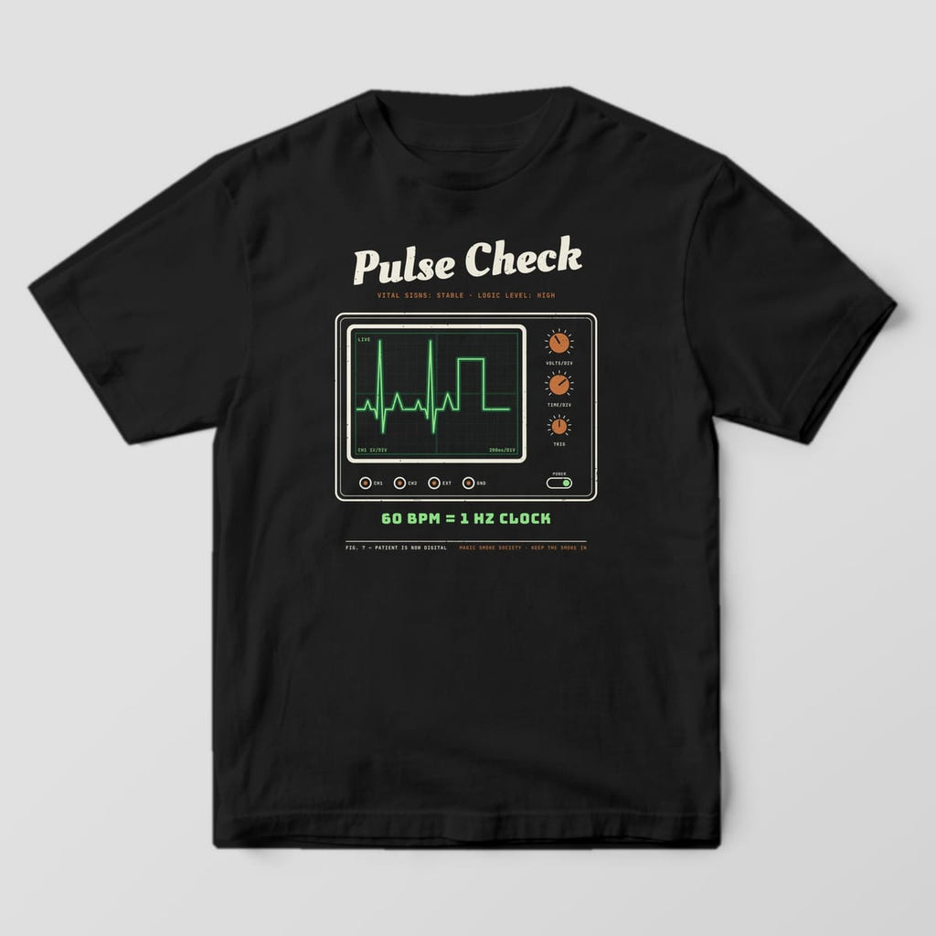 Front of a black Comfort Colors 1717 tee with a full-front Pulse Check oscilloscope print in cream, copper and green.