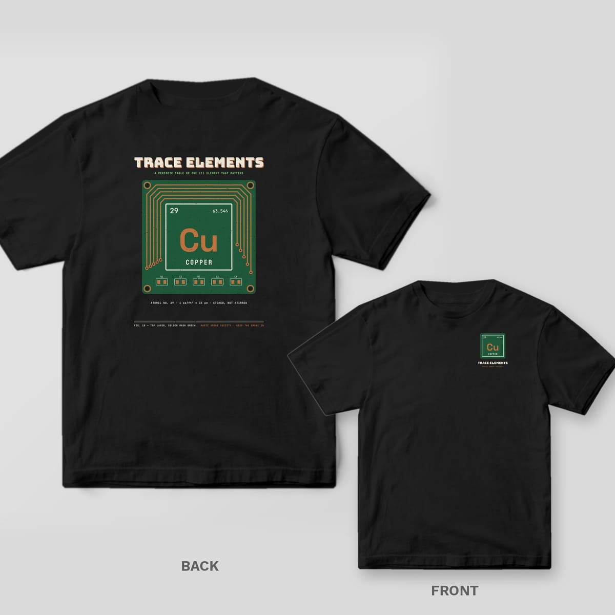 Black tee shown back and front: back has a green circuit board with copper traces around a Cu copper periodic tile under Trace Elements; front has a small tile.