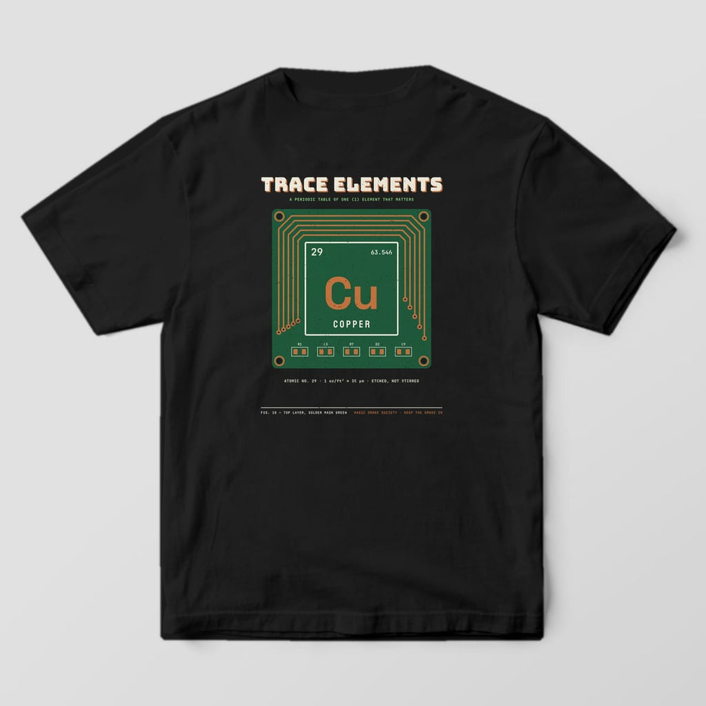 Back of a black Comfort Colors 1717 tee with a green PCB print showing the copper element tile and traces.