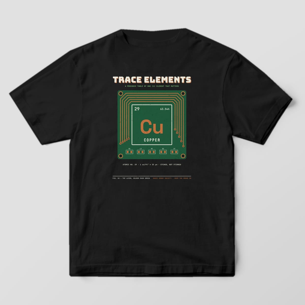 Back of a black Comfort Colors 1717 tee with a green PCB print showing the copper element tile and traces.